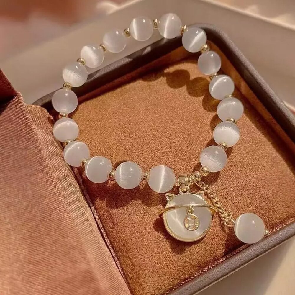 White Beaded Bracelet with Gold Charm